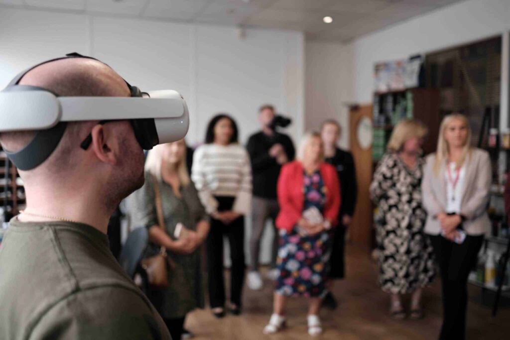 Dave Using VR Headset in Front of Crowd